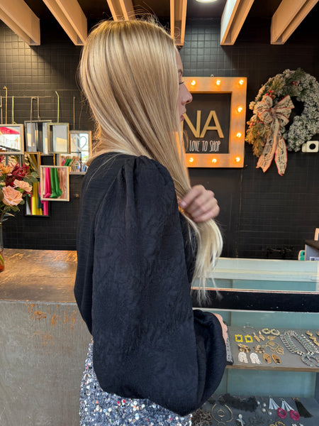 Blusa textura mangas