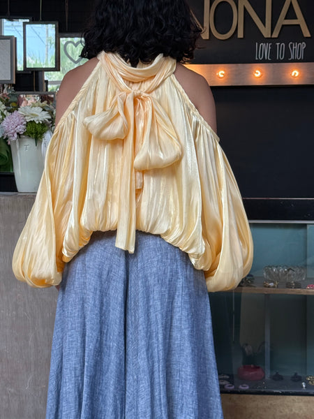 Blusa holgada amarillo brillante