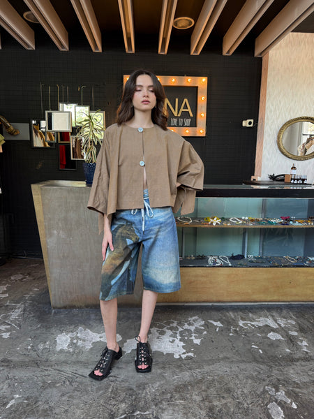 Blusa tipo capa