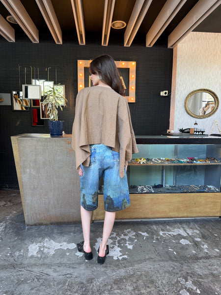 Blusa tipo capa