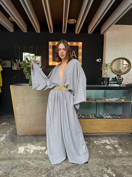 Jumpsuit de rayas y cinturón