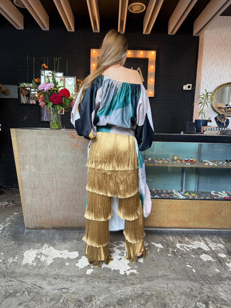 Pantalón flecos