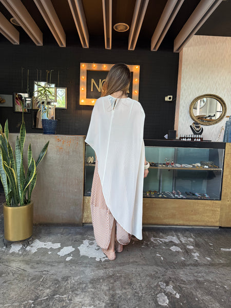 Blusa asimétrica trasparente