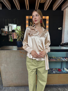 Blusa envolvente