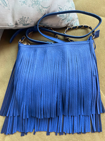 Clutch azul flecos